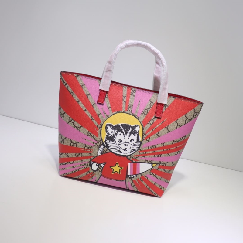 G*u*i shopping bags